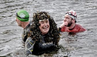 image of swimmers in river 